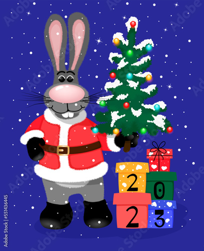 Black water rabbit in Santa Claus costume with presents  holding a Christmas tree