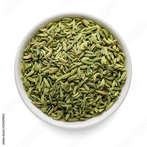 Fennel seeds in white bowl isolated on white. Top view.