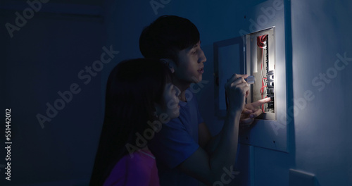 asian couple with power outage photo