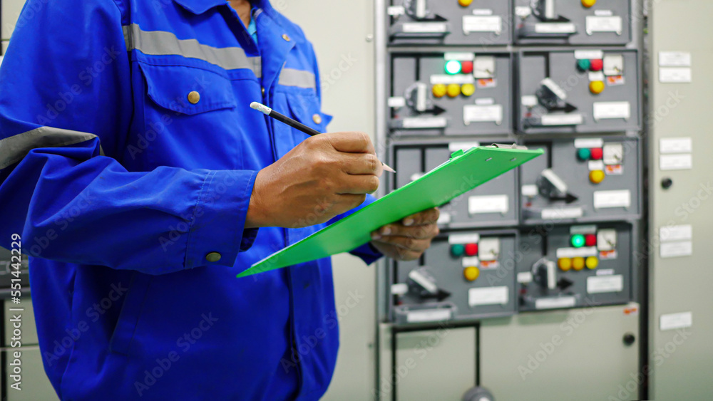 Electrical maintenance technician visual inspection electrical control in Station