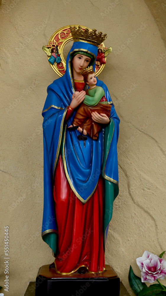 Closeup of Our lady of perpetual help statue virgin Mary with Child Jesus in the church, Thailand. selective focus. Closeup of Our lady of perpetual help statue virgin Mary with Child Jesus in the church, Thailand. selective focus.