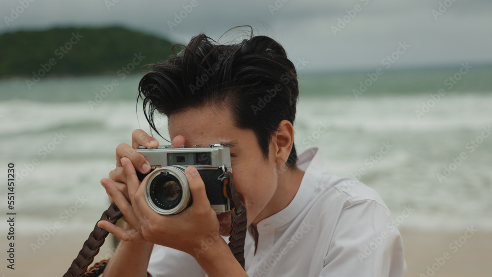 portrait of a Smiling young male photographer