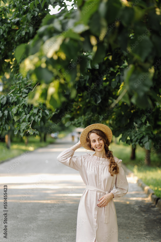 Obraz premium Young couple in love outdoor.Stunning sensual outdoor portrait of young stylish fashion couple posing in summer in field