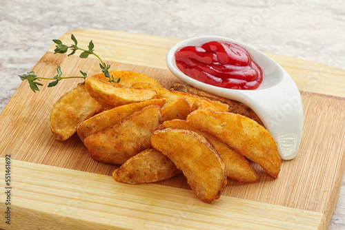 Fried rustic potato with tomato ketcup