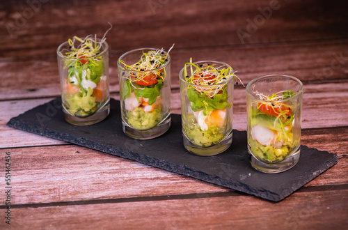 Avocado shrimp arugula mayonaise, espelette pepper and lemon, leek sprouts recipe, High quality photo