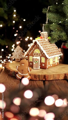 gingerbread house with christmas tree and lights