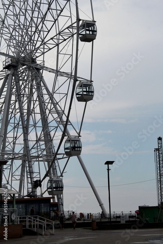 Ferris wheel against the sky in summer
