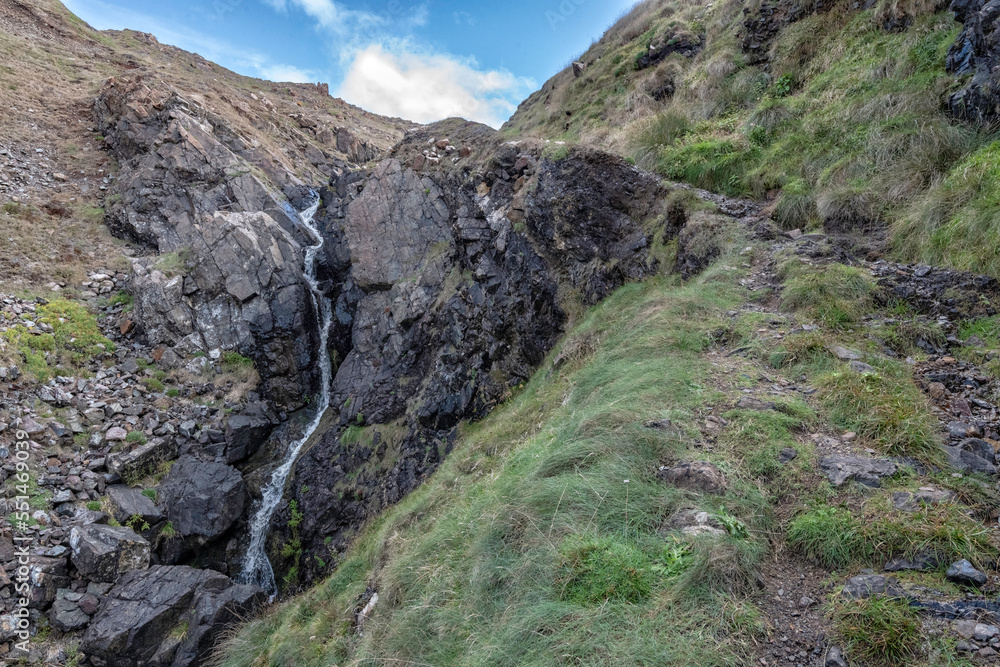 Soapy Cove on the lizard peninsular Cornwall showing water falls seals and their pups Soapy Cove on the lizard peninsular Cornwall showing water falls seals and their pups
