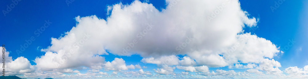 Beautiful view of blue sky with clouds. Beautiful shapes, partly cloudy. Colorful sunset. Natural sky background texture, beautiful color. Bright landscape in the blue sky. Beautiful view of blue sky with clouds. Beautiful shapes, partly cloudy. Colorful sunset. Natural sky background texture, beautiful color. Bright landscape in the blue sky.