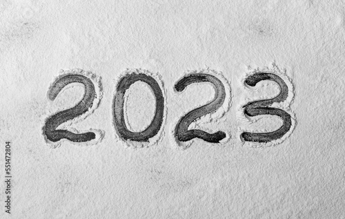 The numbers 2023 are written in the snow.