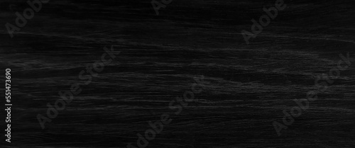Black paper house on red wood background, real estate concept, black wood background wooden gray pattern old wall top nature, weathered abstract plank. 