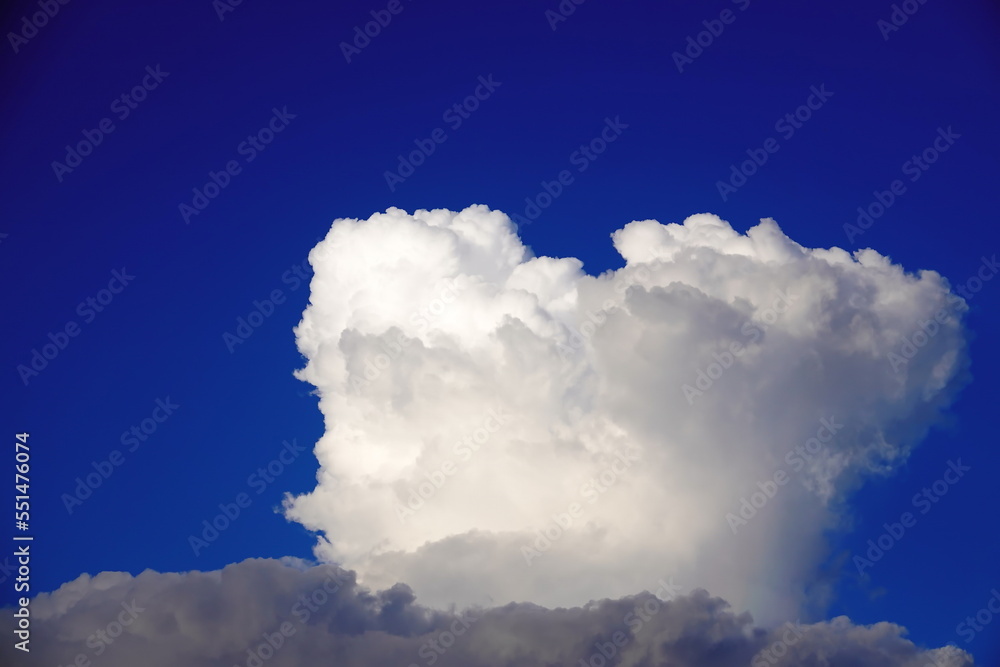 White clouds on a blue sky background White clouds on a blue sky background