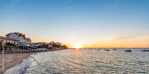 France, Nouvelle-Aquitaine, Arcachon, Panoramic view of Arcachon Bay at sunset photo