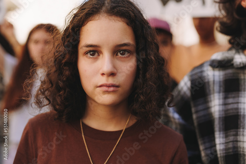 Teenage girl marching for equality and human rights