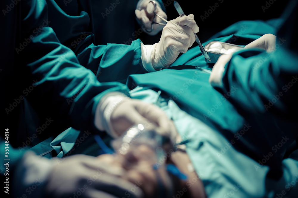 A team of professional doctors perform surgery in a hospital, a group of surgeons working in the operating theater. A team of professional doctors perform surgery in a hospital, a group of surgeons working in the operating theater.