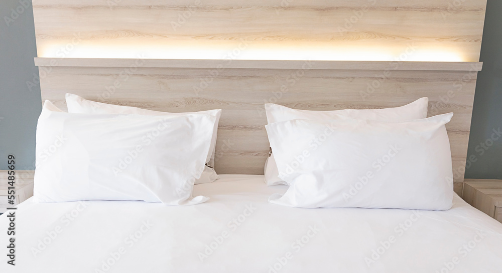 White cushion and white pillow which Modern bedroom interior with a stylish combination of trendy room image White cushion and white pillow which Modern bedroom interior with a stylish combination of trendy room image