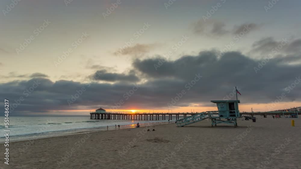 Lifeguard Tower At Manhattan Beach With Pier In The Background At Dusk In California, USA. - timelapse Lifeguard Tower At Manhattan Beach With Pier In The Background At Dusk In California, USA. - timelapse