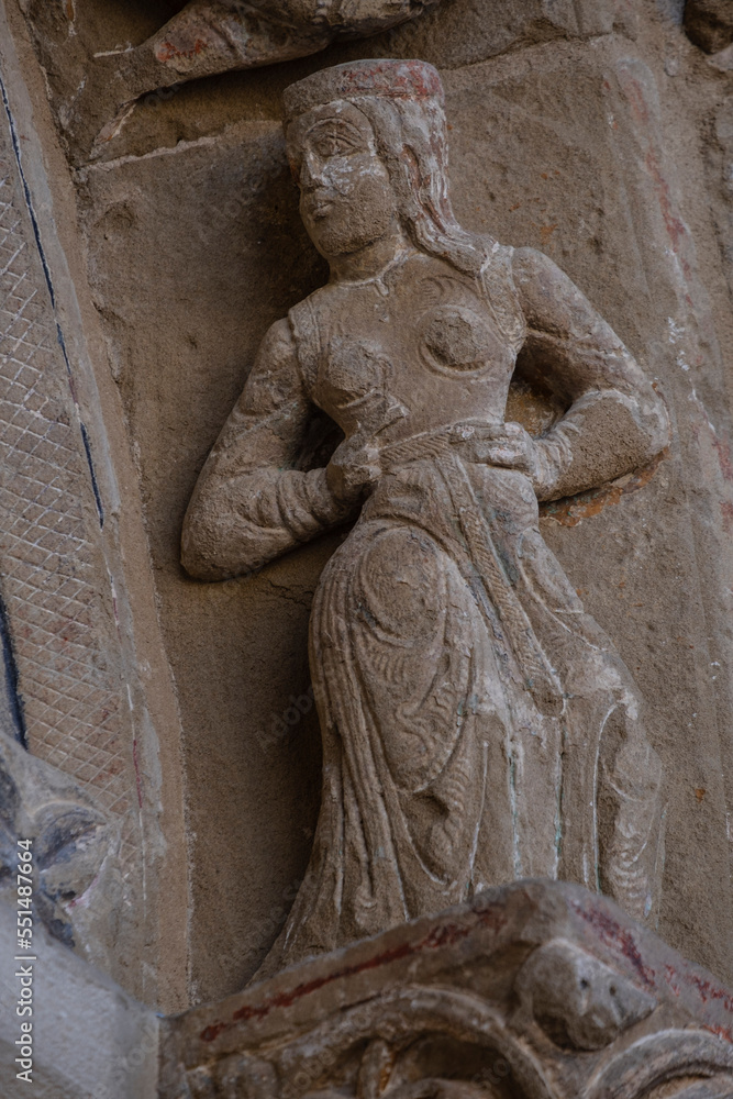 ballerina with arms on hips, North Romanesque portal, Church of El Salvador, Romanesque from the 13th century, Ejea de los Caballeros, Cinco Villas, Aragon, Spain