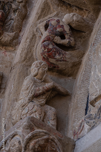 North Romanesque portal, musician playing alborgue, Church of El Salvador, Romanesque from the 13th century, Ejea de los Caballeros, Cinco Villas, Aragon, Spain photo