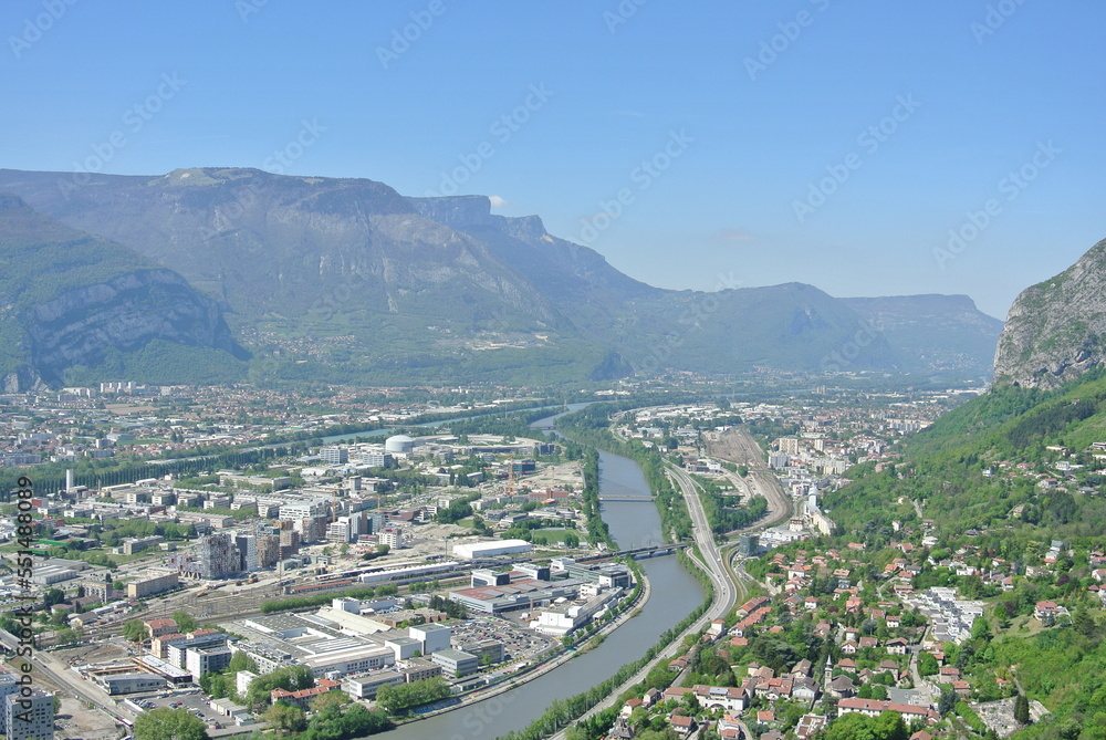 View of the city Grenoble in France with mountains in the background and river on a nice sunny day 