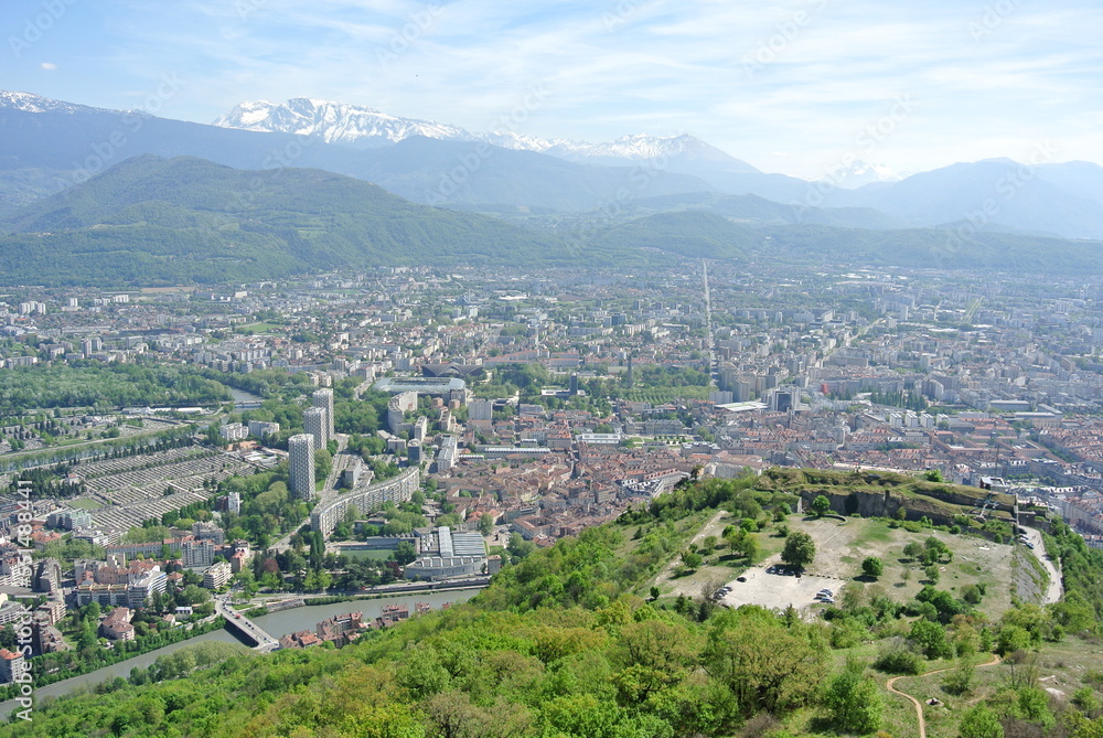 View of the city Grenoble in France with mountains in the background on a nice sunny day 