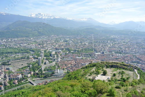 View of the city Grenoble in France with mountains in the background on a nice sunny day 