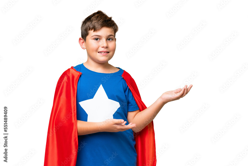 Super Hero caucasian kid over isolated chroma key background extending hands to the side for inviting to come Super Hero caucasian kid over isolated chroma key background extending hands to the side for inviting to come