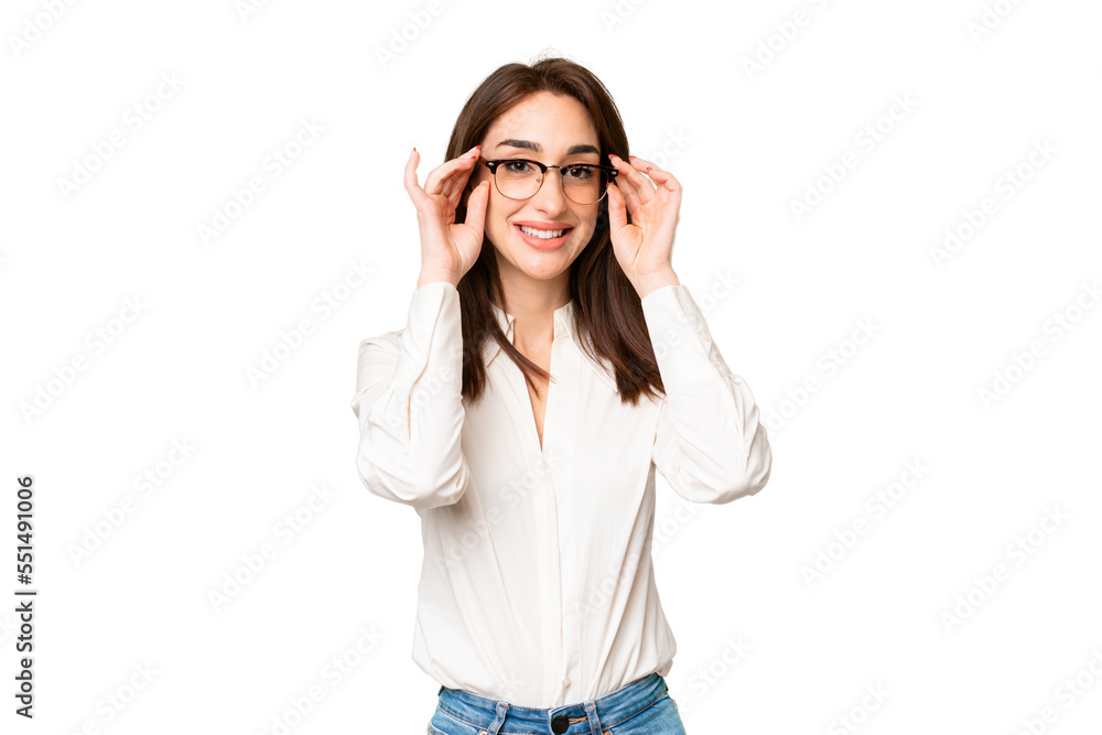 Young caucasian woman over isolated chroma key background with glasses and surprised Young caucasian woman over isolated chroma key background with glasses and surprised
