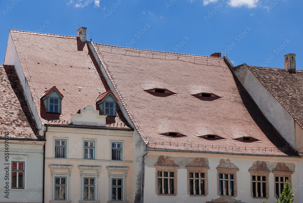 Many of houses on south and east sides of Sibiu look as though they have eyes peering from their roofs. These cartoonish features give impression that buildings never sleep, Romania