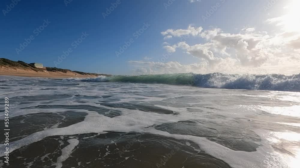 Slow motion of wave breaking on the beach shore. Slow motion of wave breaking on the beach shore.