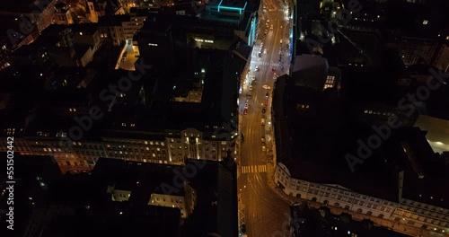 Prague Czechia Aerial v30 birds eye view fly above na porici street towards florenc neighborhood capturing busy night downtown cityscape and traffic light trail - Shot with Mavic 3 Cine - October 2022 photo