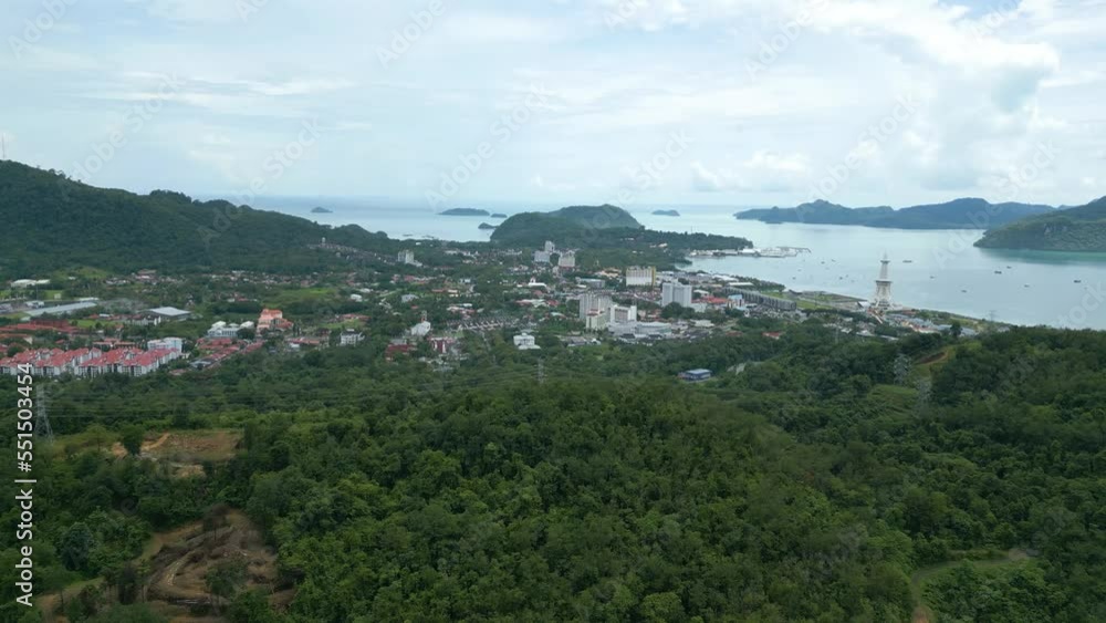 Aerial view of Langkawi city with jungle, mountain, and sea in the surrounding Aerial view of Langkawi city with jungle, mountain, and sea in the surrounding
