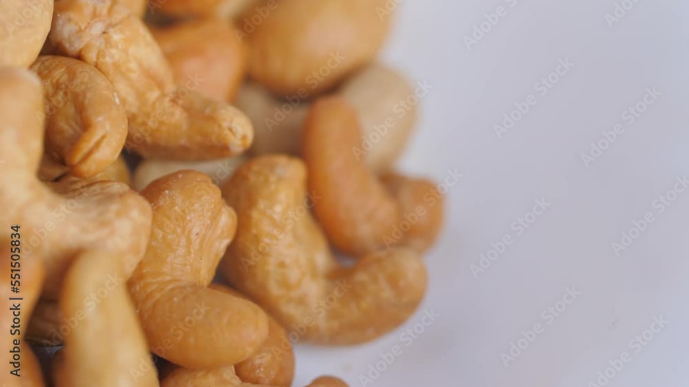 Close-up shot of cashew nuts natural food ingredient. High protein for diet and keto food from nature. Selective focus shallow depth of field Close-up shot of cashew nuts natural food ingredient. High protein for diet and keto food from nature. Selective focus shallow depth of field