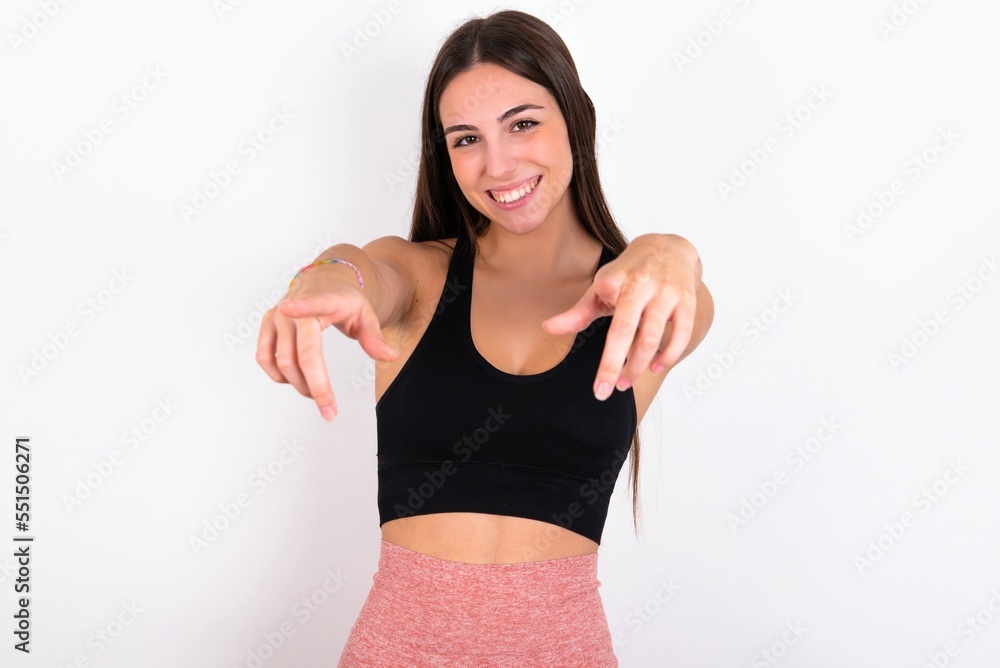 Close-up portrait of surprised MODEL pointing with two fingers to the camera saying: I choose you!, looking up with open mouth. Close-up portrait of surprised MODEL pointing with two fingers to the camera saying: I choose you!, looking up with open mouth.