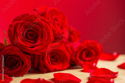 bouquet of red roses on red background