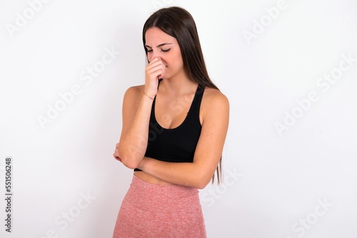 MODEL, holding his nose because of a bad smell.