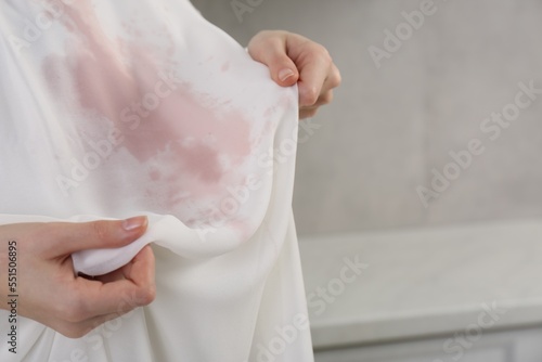 Wallpaper Mural Woman with wine stain on her clothes indoors, closeup. Space for text Torontodigital.ca