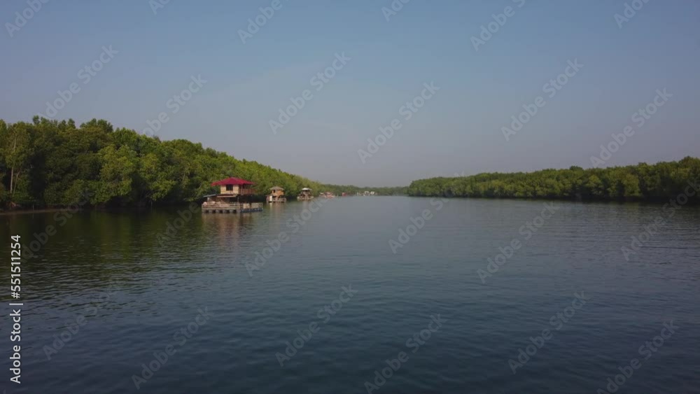 Drone View of floating house on Bagan Lalang river, Sepang, Selangor, Malaysia Drone View of floating house on Bagan Lalang river, Sepang, Selangor, Malaysia
