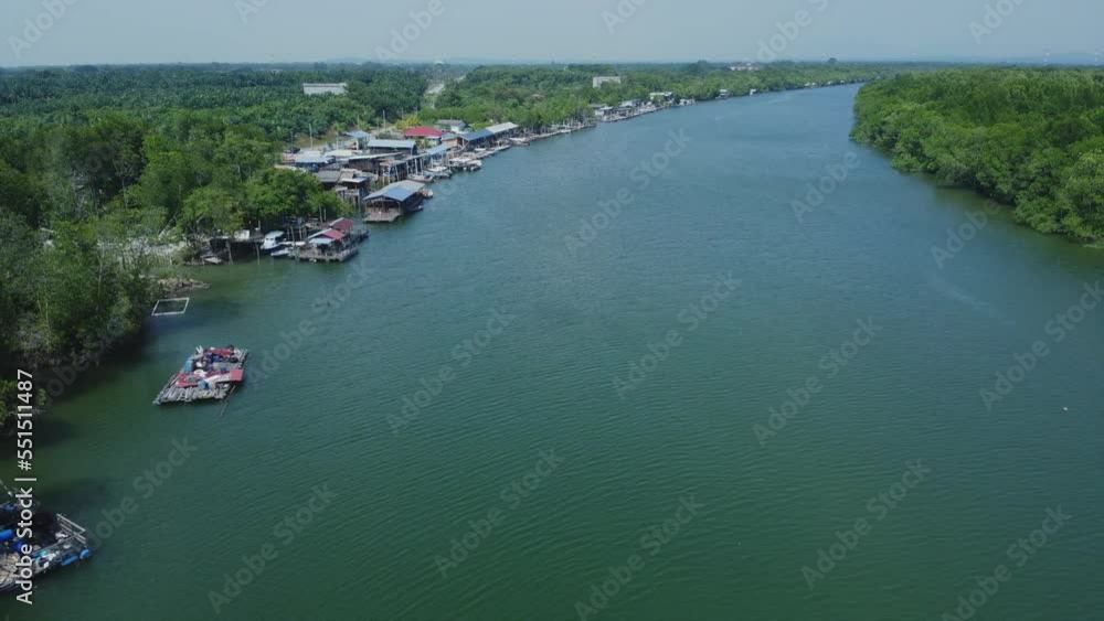 Aerial drone View of Bagan Lalang river in the morning with floating houses Aerial drone View of Bagan Lalang river in the morning with floating houses