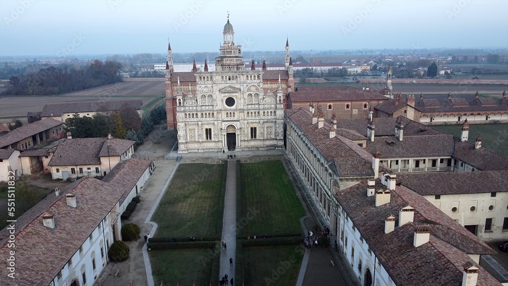 Fototapeta premium Europe, Italy , Pavia 2022 - Certosa di Pavia is a religious monastery of Carthusian friars near Milan - founded by Visconti family - drone aerial view