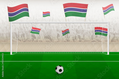 Gambia football team fans with flags of Gambia cheering on stadium, penalty kick concept in a soccer match.