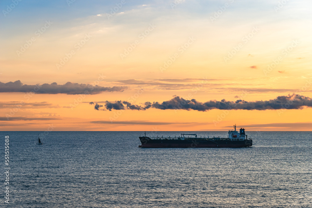 Oil Tanker Ship at Mediterranean Sea at sunrise, Barcelona, Spain, Europe