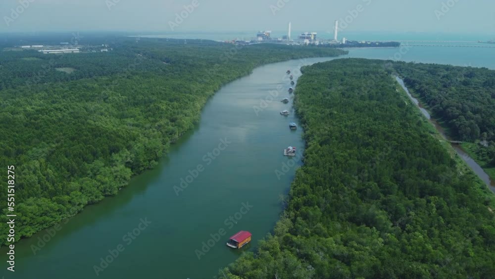 Aerial drone View of Bagan Lalang river in the morning with floating housees Aerial drone View of Bagan Lalang river in the morning with floating housees