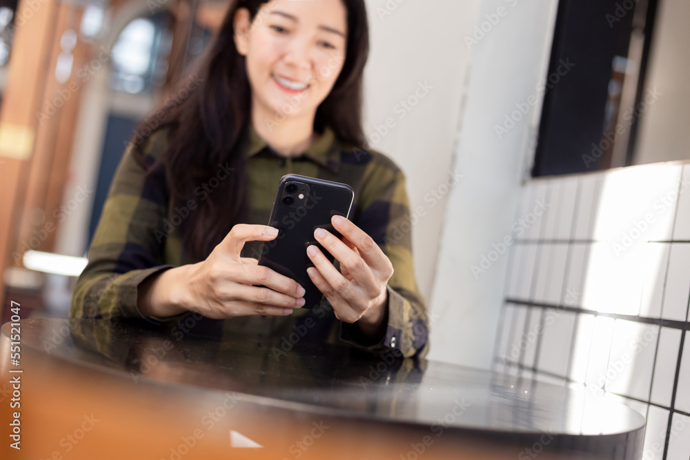 using cell phone hand holding mobile texting message contact us.chatting,search internet information in office.technology device communication connecting using cell phone hand holding mobile texting message contact us.chatting,search internet information in office.technology device communication connecting