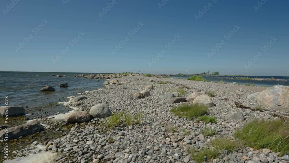 The big and small rocks on the sea shore on a hot sunny day in Estonia The big and small rocks on the sea shore on a hot sunny day in Estonia