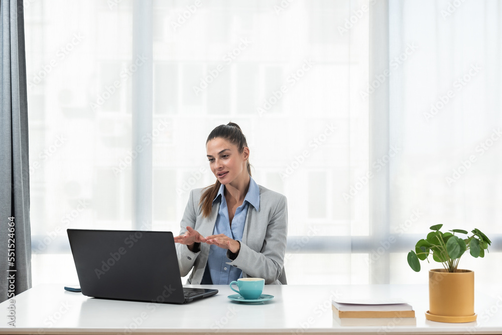 Regular daily routine of business woman office worker on her job with laptop computer during the working hours. Regular daily routine of business woman office worker on her job with laptop computer during the working hours.