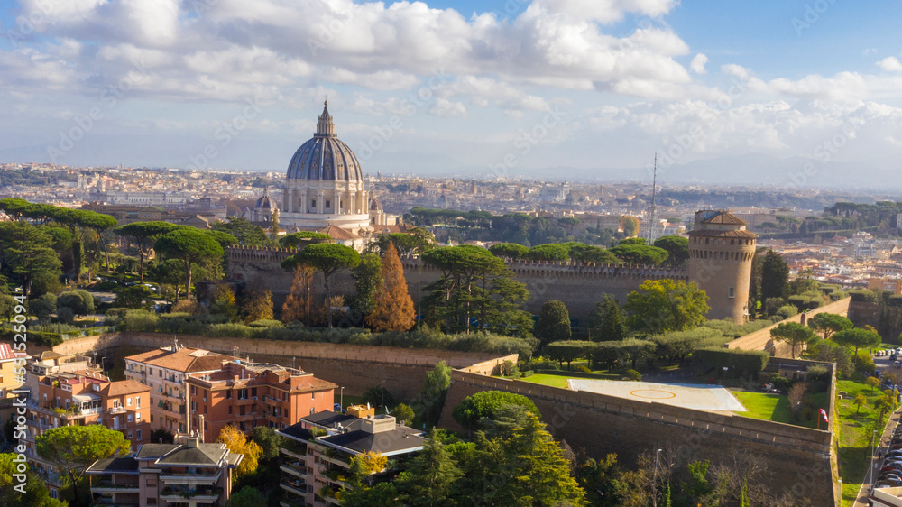 Fototapeta premium Aerial view of Papal Basilica of Saint Peter in the Vatican located in Rome, Italy. It's the most important and largest church in the world and residence of the Pope. Around it are the Vatican gardens
