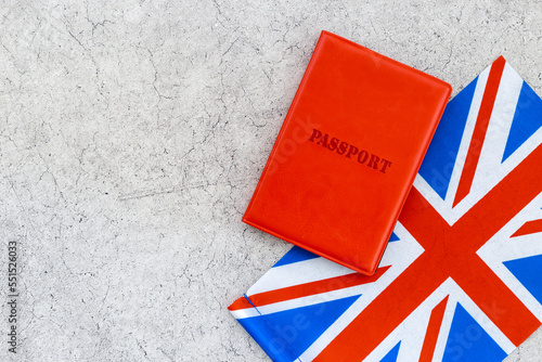 Flag of UK Great Britain with passport. Travel visa and citizenship concept