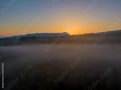 Beautiful drone view of sunrise north Corfu under the Mist
