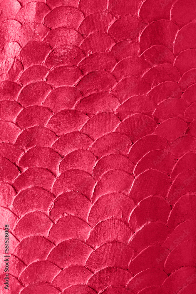 Obraz premium Close up pattern of mermaid or fish scales tiles toned in trendy color of the 2023 year Viva Magenta